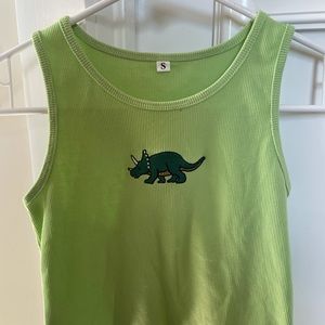 Green ribbed tank top with green dinosaur patch